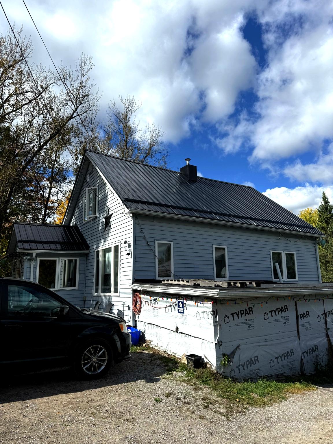 Ribbed steel metal roofing